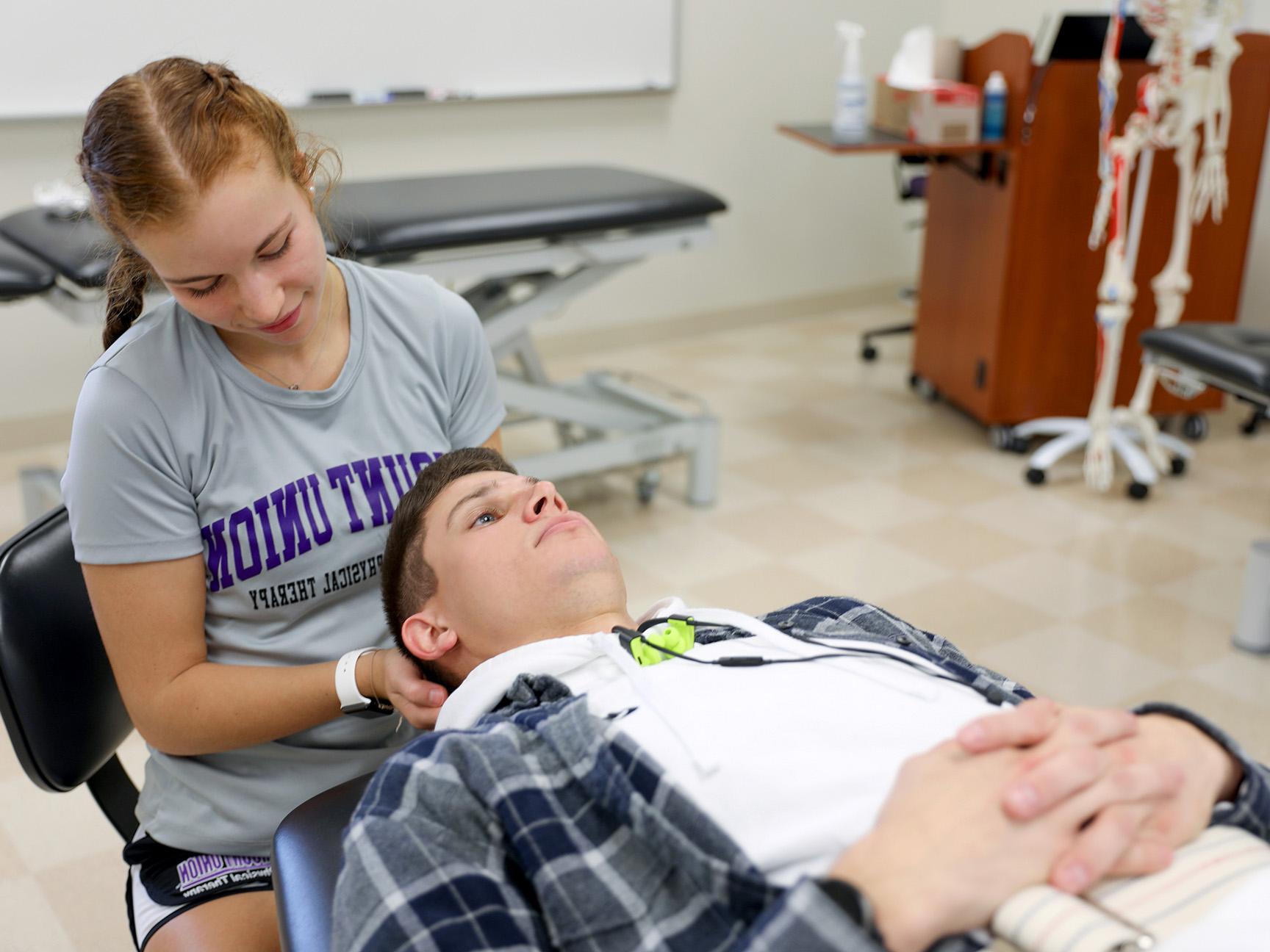 Students working in a physical therapy lab